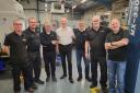 The Martin Precision employees who have been with the firm since it opened in 1993, from left: Steven McKay, Martin McKay, Tom Morrison, William Martin, Dougie Smith, Stuart Thomson, and Alan McLellan