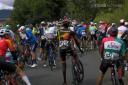 Cyclists stopped after protesters disrupted the men's road race