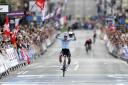Belgium’s Lotte Kopecky celebrates winning the Women’s Elite Road Race