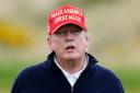 Former US president Donald Trump playing golf at Turnberry golf course during his visit to the UK (Jane Barlow/PA)