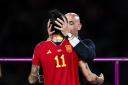 President of the Royal Spanish Football Federation Luis Rubiales kisses Jennifer Hermoso of Spain