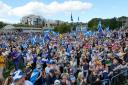 Believe In Scotland and Yes For EU rally crowds in front of the Scottish Parliament at Holyrood