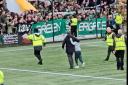 Brendan Rodgers walked a young fan back to his seat
