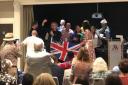 Alex Cole-Hamilton waves the Union flag at a LibDem conference party