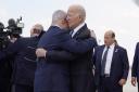 President Joe Biden is greeted by Israeli Prime Minister Benjamin Netanyahu after arriving at Ben Gurion International Airport in Tel Aviv