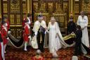 King Charles III and Queen Camilla leave after the State Opening of Parliament at the Houses of Parliament on November 7