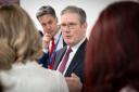 Labour leader Sir Keir Starmer and shadow climate change secretary Ed Miliband hold a media briefing during Cop28 (Stefan Rousseau/PA)