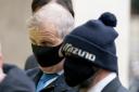 Kevin Sweeney, left, and Ian Beim wear face masks as they arrive at Westminster Magistrates' Court
