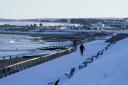 A snow covered beach front in Aberdeen