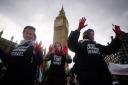 Protesters block Westminster Bridge during a Free Palestine Coalition demonstration in central London