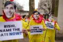 Demonstrators dressed as chickens protest opposite Downing Street in London as Labour is calling on Rishi Sunak to name the General Election date