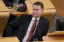 Tory MSP Murdo Fraser has threatened the police with legal action