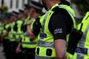 Police Scotland are looking for a man who threatened officers with a knife