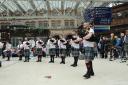 The pipe band surprised commuters in Glasgow Central