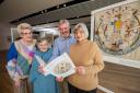 The Dundee Tapestry will return to V&A Dundee later this year. Pictured (L-R): Lily Thomson, Marilyn Gillies, John Fyffe MBE and Sheena Wellington. Lily, Marilyn and Sheena are all featured in the tapestry