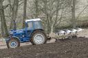 1991 Ford 8630 Power Shift with four furrow Kverneland plough seen working near Auchterhouse, Dundee.