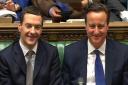 George Osborne and David Cameron listen as Ed Miliband responds to the Budget