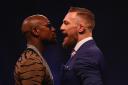 Floyd Mayweather faces off with Conor McGregor