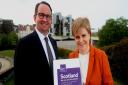 First Minister Nicola Sturgeon received the Sustainable Growth Commission report from commission chair Andrew Wilson. Photograph: Gordon Terris
