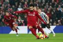 LIVERPOOL, ENGLAND - DECEMBER 26:  Mohamed Salah of Liverpool scores his team's second goal from a penalty during the Premier League match between Liverpool FC and Newcastle United at Anfield on December 26, 2018 in Liverpool, United Kingdom.  (Photo 