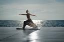 The Marbella Club hotel’s scenic setting is perfect for beachside yoga