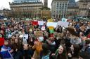 Young people pictured in George Square, Glasgow where they were protesting to raise awareness of climate change in 2019. Photograph: Colin Mearns