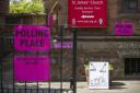 Signs outside polling station at St James' Church in Edinburgh
