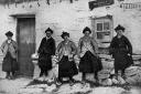 A group of village lads outside the Post Office on the island of Inishmaan in the Aran Isles where John Millington Synge spent his summers