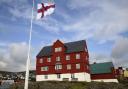 The Faroe Islands Parliament building at the small and rocky Tinganes peninsula in Torshavn, Denmark