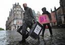 Election staff from City of Edinburgh Council deliver signage and ballot boxes to a polling station in 2017/PA Media