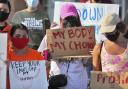 Abortion rights supporters in Texas hold signs that read: 'My body, my choice'