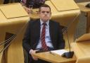 Scottish Tory leader Douglas Ross works full-time roles as both an MSP and an MP while working part-time as a football linesman