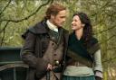 Sam Heughan and Caitríona Balfe appearing in the hit show Outlander