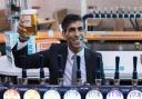 Rishi Sunak has been criticised for leaving the UK amid a crisis in the hospitality sector