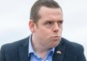 Scottish Tory chief Douglas Ross spoke out after the Tories lost two seats in England