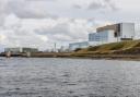 A leak from a substation at Torness nuclear power station has led to people being warned to avoid nearby waters