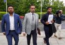 Qasim Sheikh, Aamer Anwar and Majid Haq (left-right) arrive for a press conference at Stirling Court Hotel. Photograph: PA