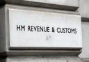 HMRC has apologised after residents of a Midlothian estate were given English tax codes