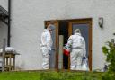 Forensics officers at the scene of an incident involving a firearm at a property in the Teangue area on the Isle of Skye in Scotland