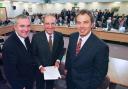 Prime Minister Tony Blair (right), US Senator George Mitchell (centre) and Irish Prime Minister Bertie Ahern after they signed the Good Friday peace agreement