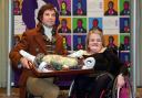 Chris Tait, a Burns reanactor, with Ella Chambers