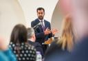 Humza Yousaf speaks during an anti-poverty summit at Dovecot Studios, Edinburgh