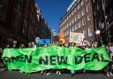 Hundreds of young people join a 2021 march in London during a Global Climate Strike