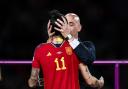 President of the Royal Spanish Football Federation Luis Rubiales kisses Jennifer Hermoso of Spain