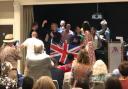 Alex Cole-Hamilton waves the Union flag at a LibDem conference party