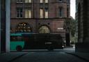 An Ember bus makes its way into Edinburgh city centre