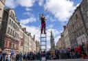 A street performer on Edinburgh's Royal Mile during the city's Festival Fringe