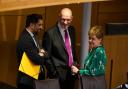 John Swinney with Humza Yousaf and Nicola Sturgeon just before the Holyrood vote that saw him appointed First Minister