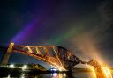 The Northern Lights were visible across Scotland on Friday night, including over the Forth Bridge