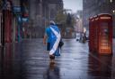 A Yes supporter photographed walking after the results of the 2014 referendum were announced